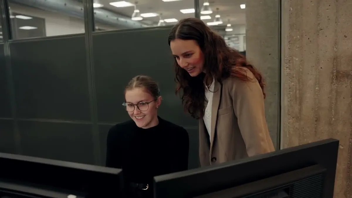 Autorola Group employees reviewing customer insights together